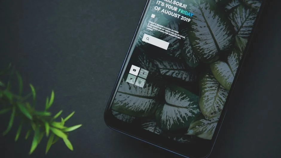 A focused designer works on a user-centric project in a modern office environment.